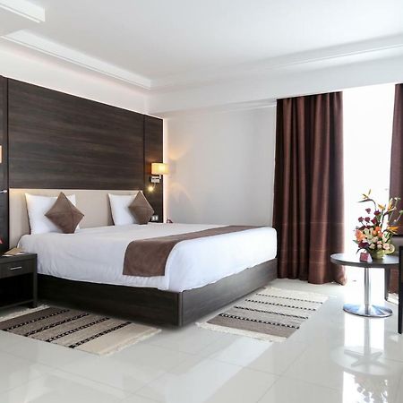 Radisson Hotel Sfax Ngoại thất bức ảnh A bedroom at the hotel