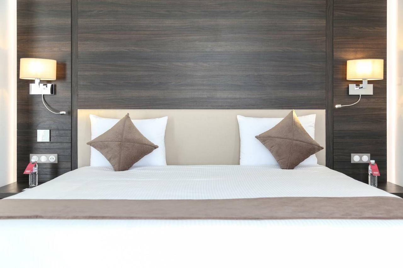 Radisson Hotel Sfax Ngoại thất bức ảnh A bed